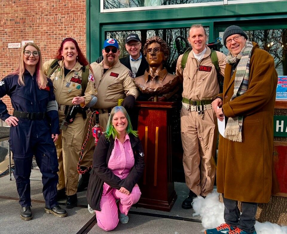 Grant DePorter poses with "Ghostbusters" and actors from the Groundhog Day film.